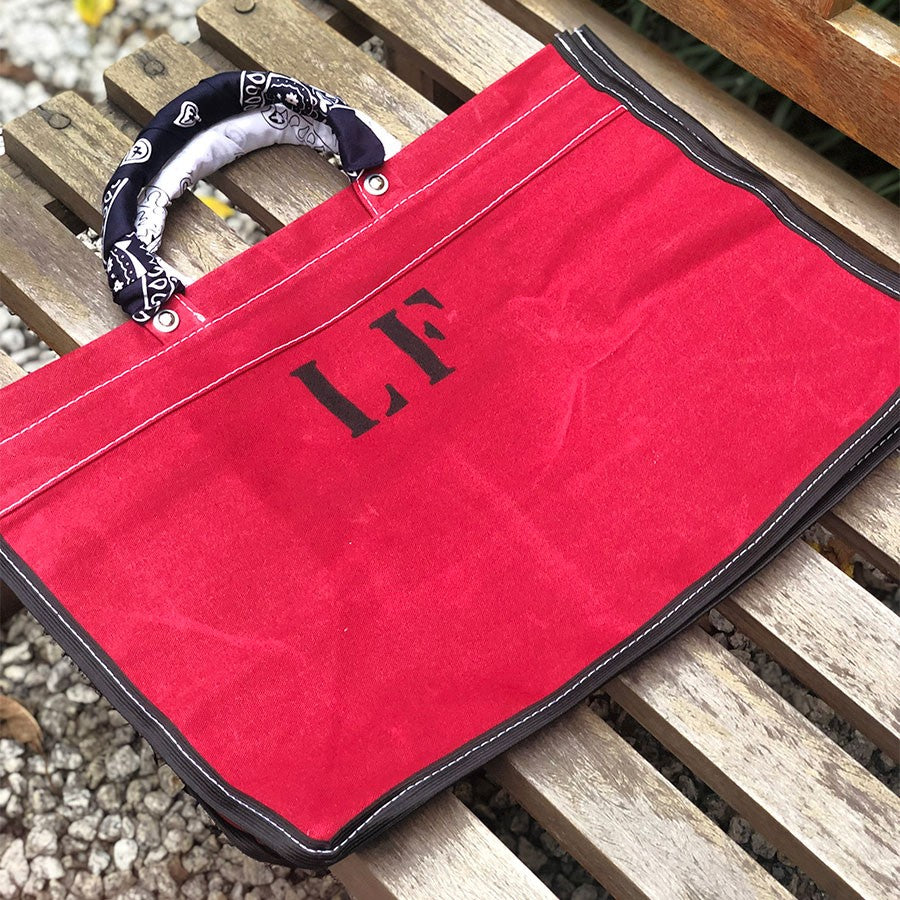 RED CANVAS BAG WITH BANDANAS IN RANDOM COLORS