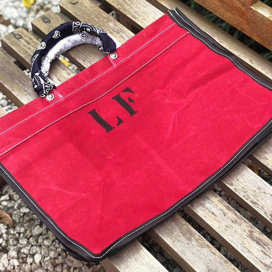 RED CANVAS BAG WITH BANDANAS IN RANDOM COLORS